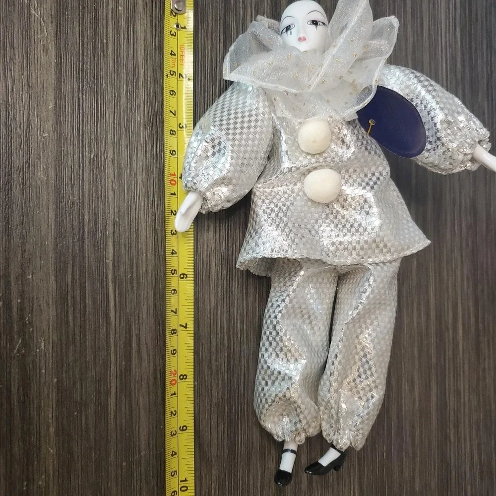 Royal Heirloom Collection 10 in Porcelain Clown Doll Shiny Silver Ruffled Suit